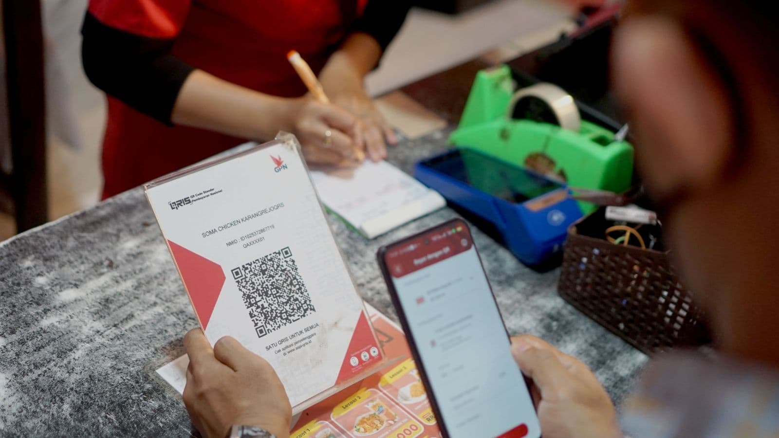Ilustrasi Penggunaan Qris. (Foto: Info Publik)